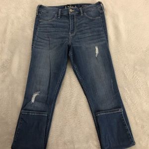 Slight distressed denim body hugging skinny jeans